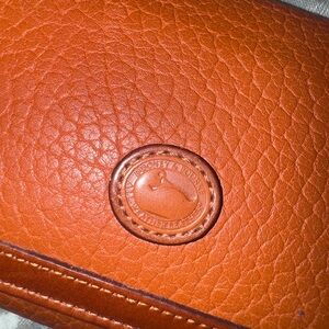 Dooney & Bourke Pebbled Leather Wallet in Orange Brown